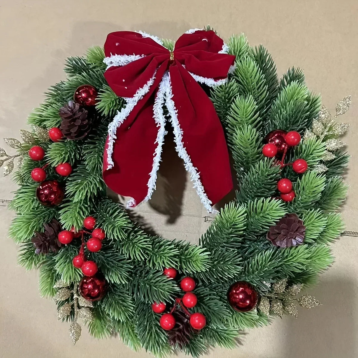 Christmas Wreath with Red Velvet Bow, Ornaments, and Fairy Lights for Door or Wall Hanging